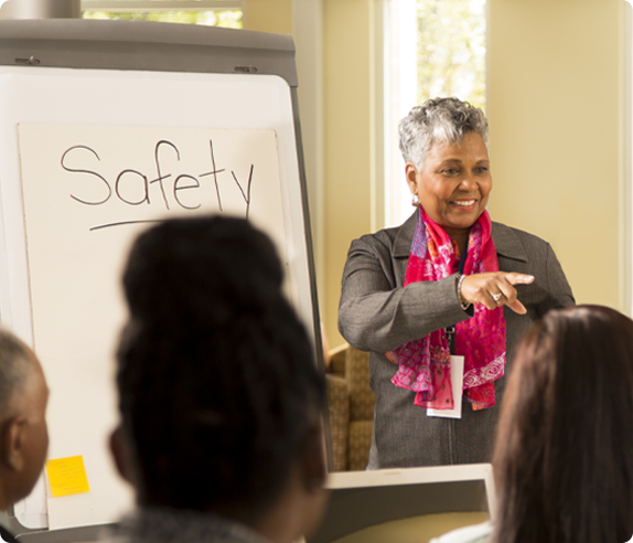 An instructor going through safety trainings with a class