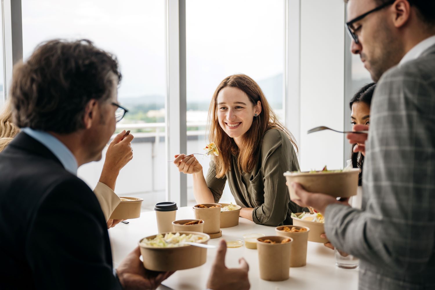 Coworkers in Ministry appreciating and talking over lunch